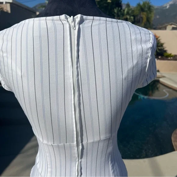 B. Darlin
Pinstripe Square Neck Mini Dress Tie Back Empire Waist
Size 3/4 - Picture 12 of 15